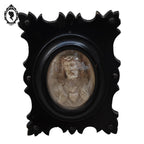 Paire de cadres reliquaires verre bombé noir ovale Christ et Marie calcaire pétrifié ancien Napoléon 3