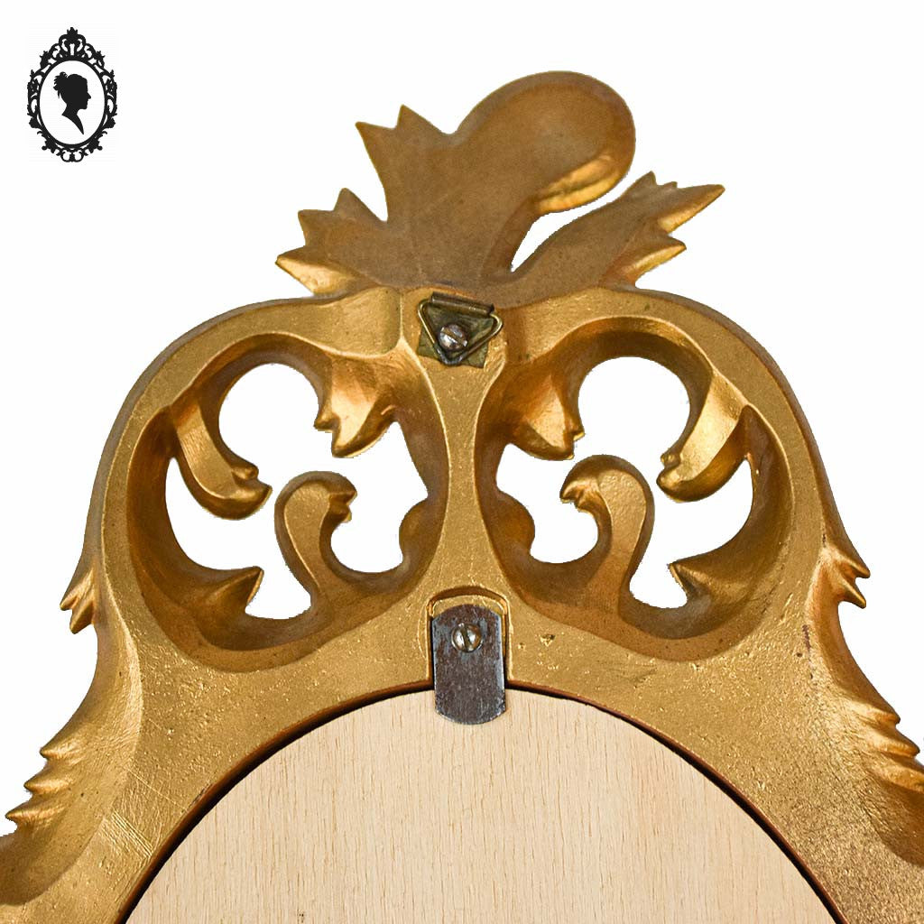 Petit miroir glace cadre ovale mural doré fronton arabesque baroque H 35 cm vintage