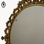 Psyché miroir doré ovale pivotant à poser sur pied H 50 cm rocaille arabesque