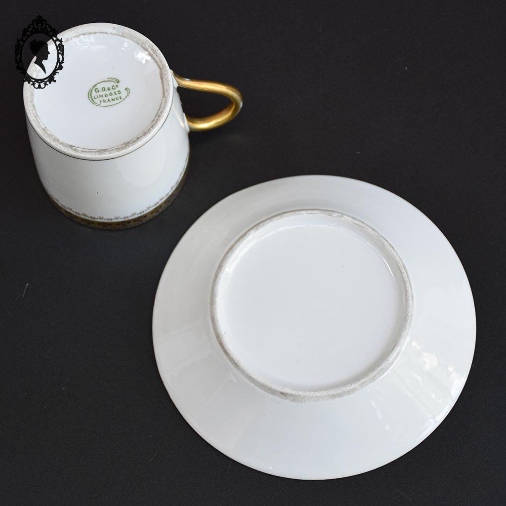 Tasse et sous tasse porcelaine blanche or décor croix G. D et C Limoges France
