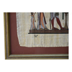 Tableau sur papyrus à décor égyptien, encadré doré