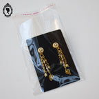 Chic paire de boucles d’oreilles percées pendantes beige doré bijoux Statu Quo