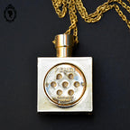 Pendentif collier concrète Yendi Capucci Paris en métal doré vintage