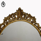 Psyché miroir doré ovale pivotant à poser sur pied H 50 cm rocaille arabesque