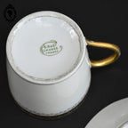 Tasse et sous tasse porcelaine blanche or décor croix G. D et C Limoges France