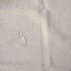 Lot 10 serviettes anciennes en damassé fleuri beige – Monogramme JA