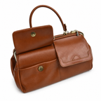 Sac à main vintage en cuir cognac à fermoir métallique et poches frontales
