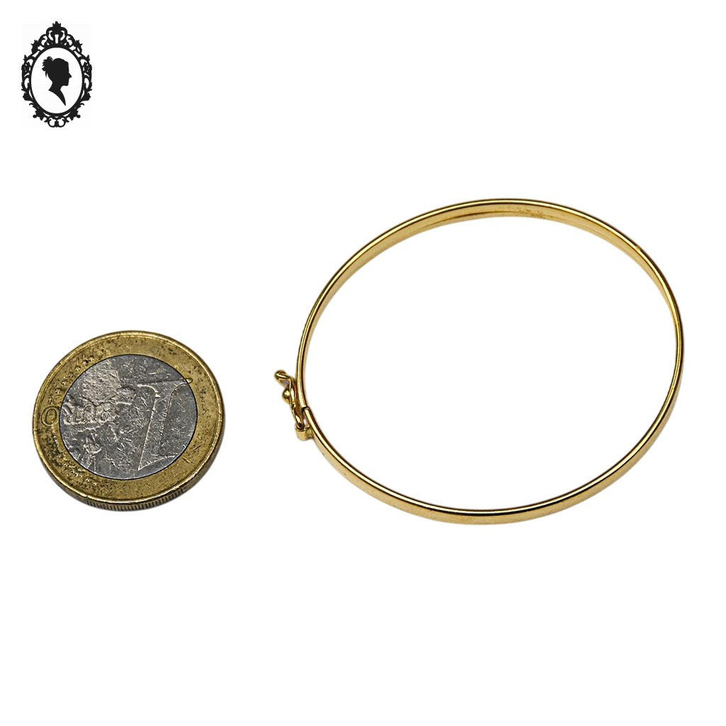 Bracelet bébé enfant jonc ovale ouvrant en or jaune avec poinçons