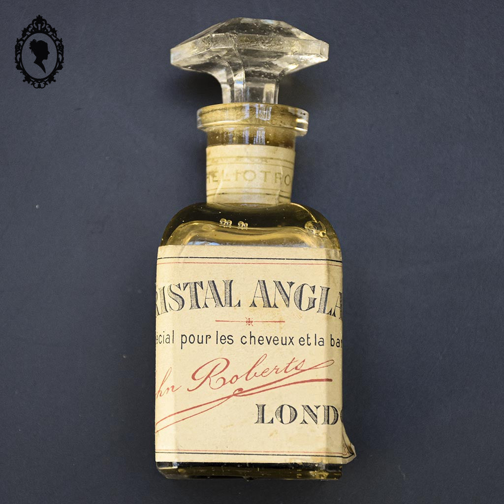 Flacon ancien collection en cristal héliotrope Anglais London pour cheveux et barbe
