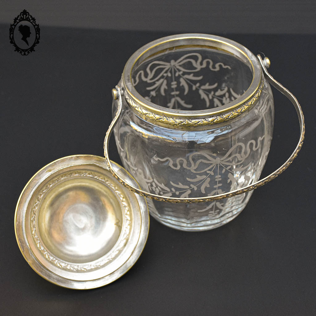 Sceau pot à biscuits en verre blanc avec nœud mat et métal doré ancien