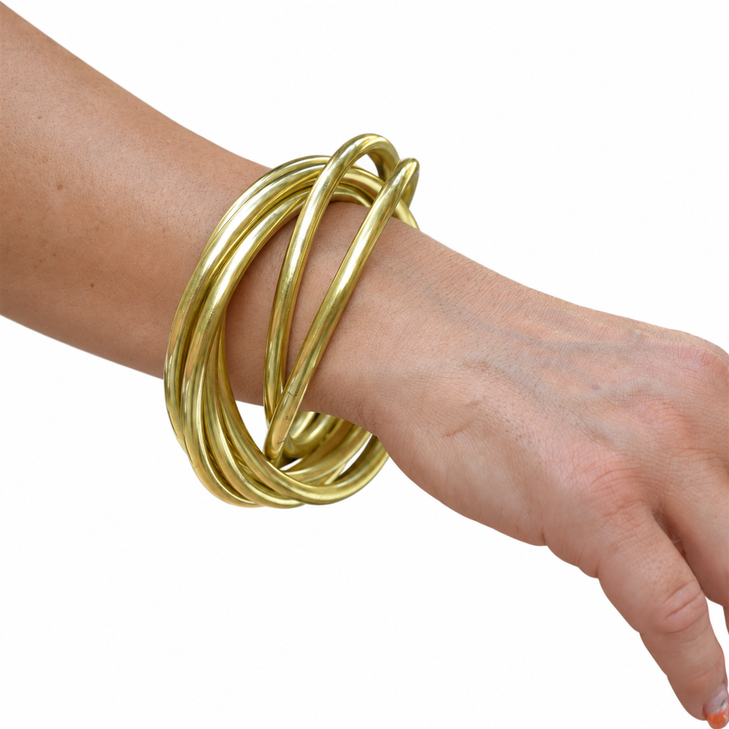 Bracelet vintage à 7 joncs entrelacés en laiton doré