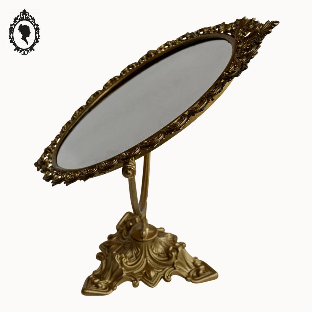 Psyché miroir doré ovale pivotant à poser sur pied H 50 cm rocaille arabesque