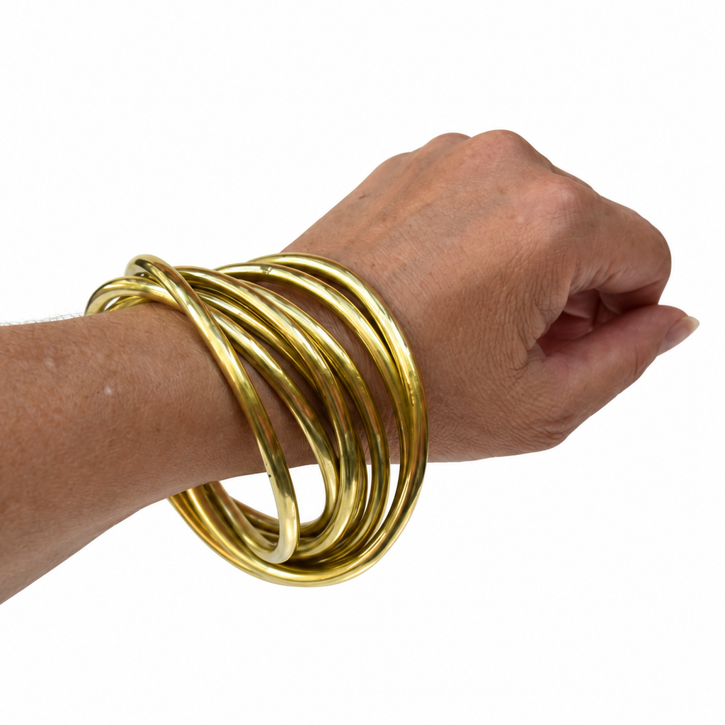 Bracelet vintage à 7 joncs entrelacés en laiton doré