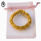 Bracelet jonc manchette articulé soleil doré Boucher vintage