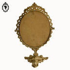 Psyché miroir doré ovale pivotant à poser sur pied H 50 cm rocaille arabesque