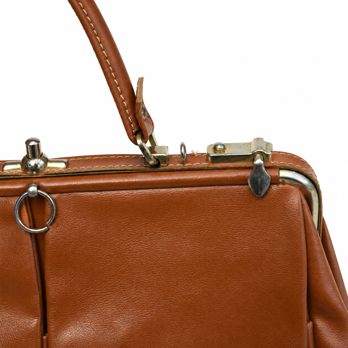 Sac à main vintage en cuir cognac à fermoir métallique et poches frontales